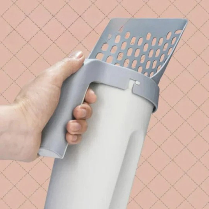 Paletta autopulente per lettiera con dispenser integrato per sacchetti