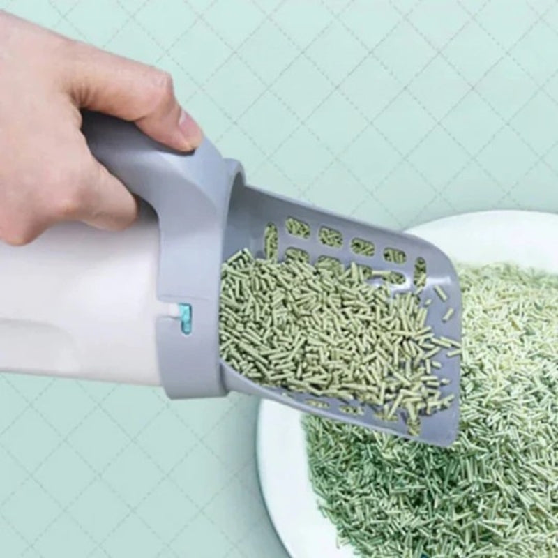 Paletta autopulente per lettiera con dispenser integrato per sacchetti