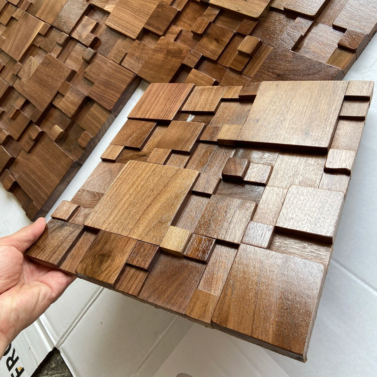 Pannelli acustici a mosaico in legno massello di faggio e noce