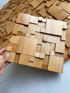 Pannelli acustici a mosaico in legno massello di faggio e noce