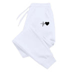 Pantaloni fitness da donna con coulisse regolabile e tasche laterali