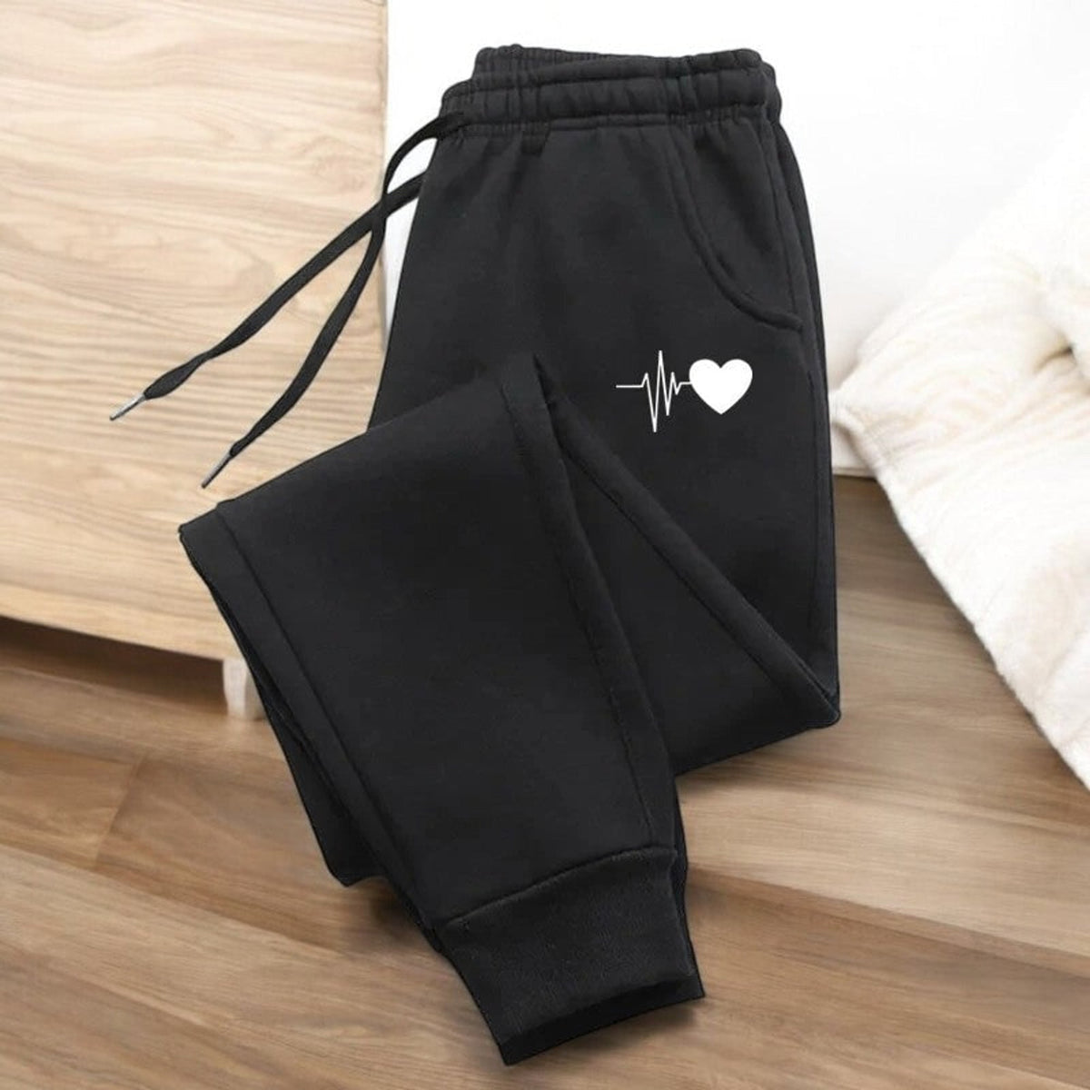 Pantaloni fitness da donna con coulisse regolabile e tasche laterali