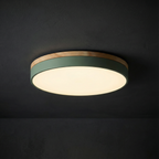 Plafoniera rotonda a filo soffitto con finitura in legno