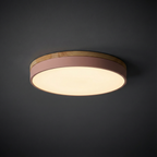 Plafoniera rotonda a filo soffitto con finitura in legno