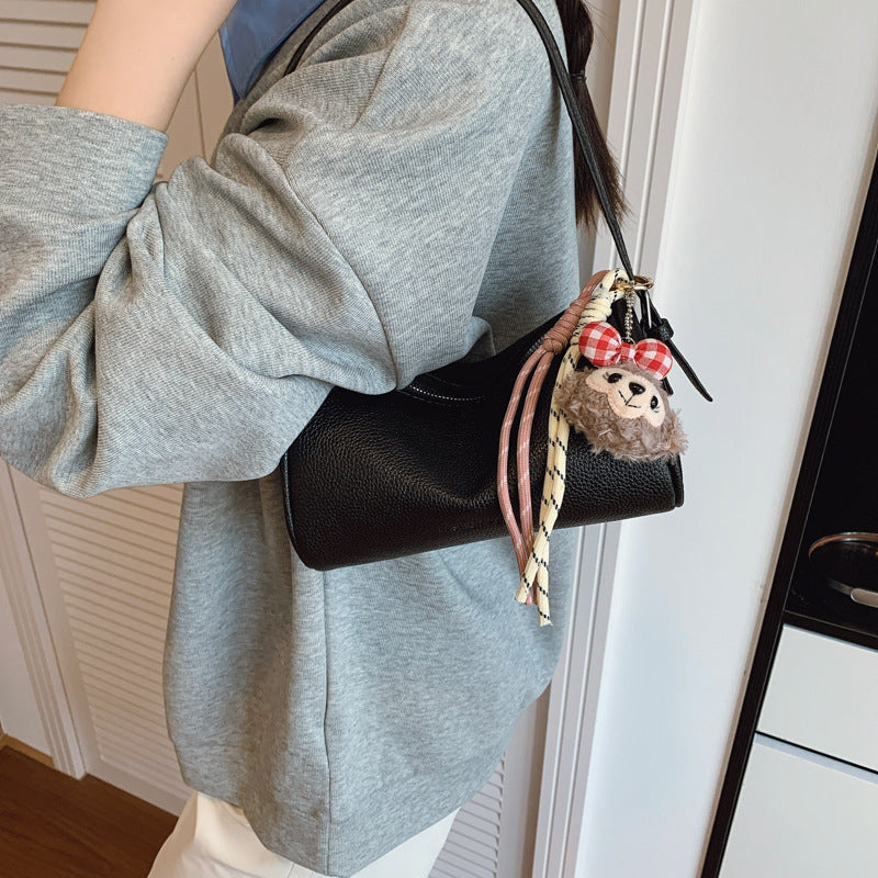 Pochette a tracolla con texture elegante