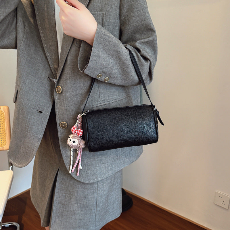 Pochette a tracolla con texture elegante