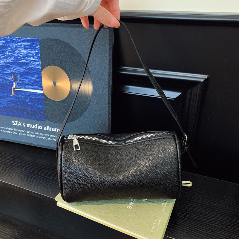Pochette a tracolla con texture elegante