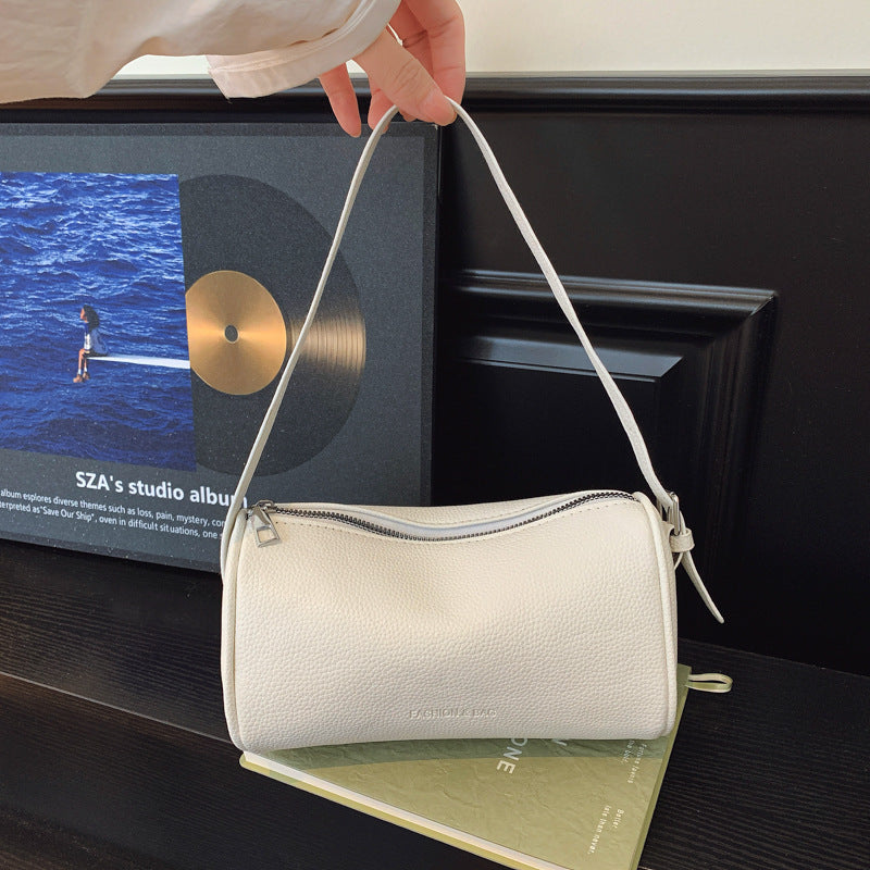 Pochette a tracolla con texture elegante