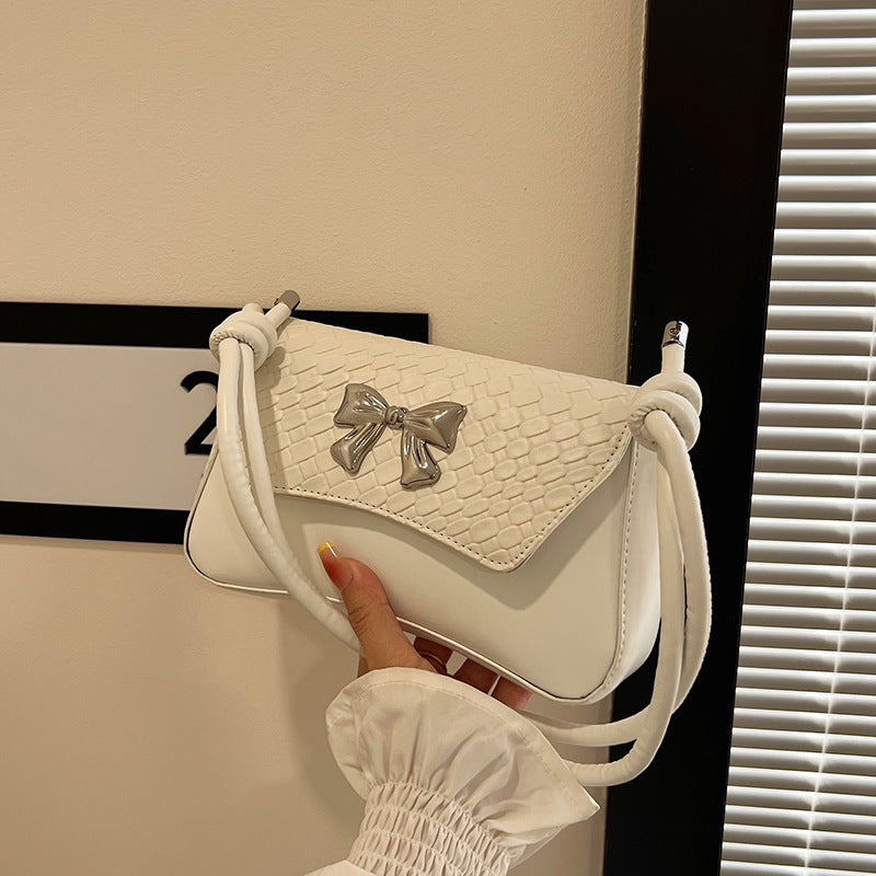 Pochette con fiocco e manico
