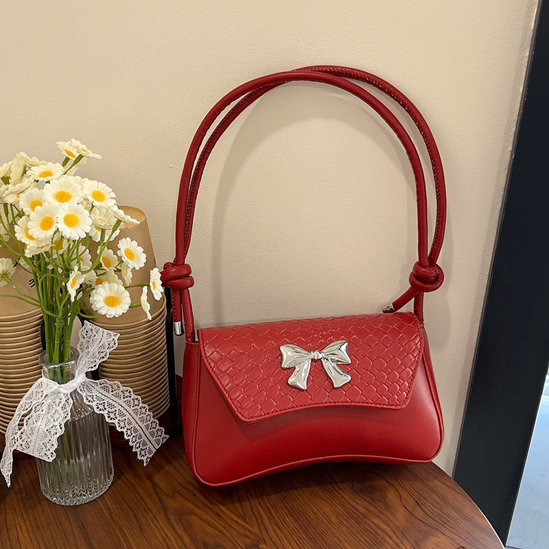 Pochette con fiocco e manico