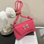 Pochette con fiocco e manico