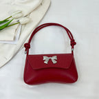 Pochette con fiocco e manico
