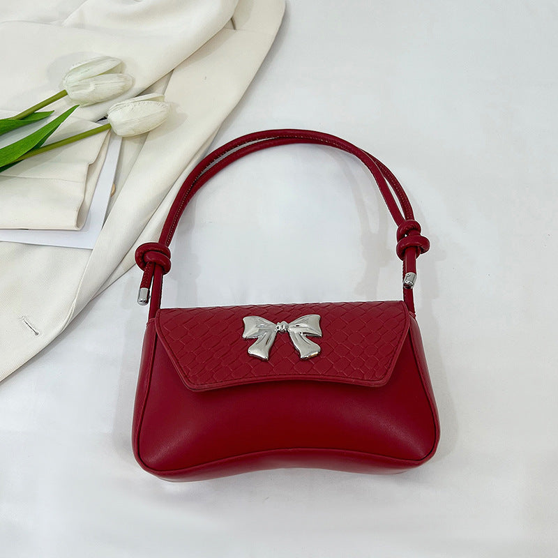 Pochette con fiocco e manico