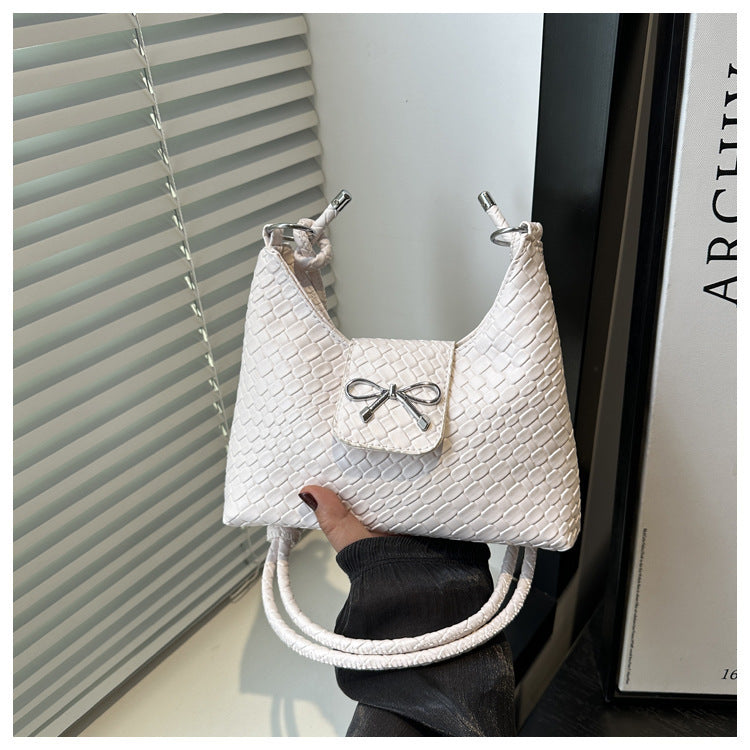 Pochette elegante con fiocco decorativo