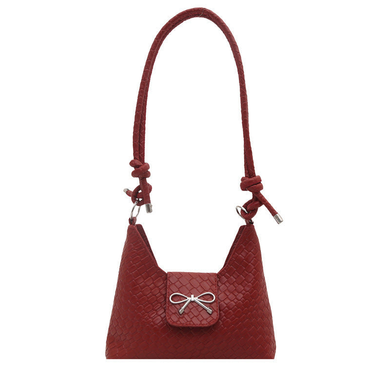 Pochette elegante con fiocco decorativo