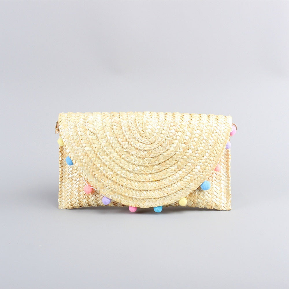 Pochette in paglia intrecciata