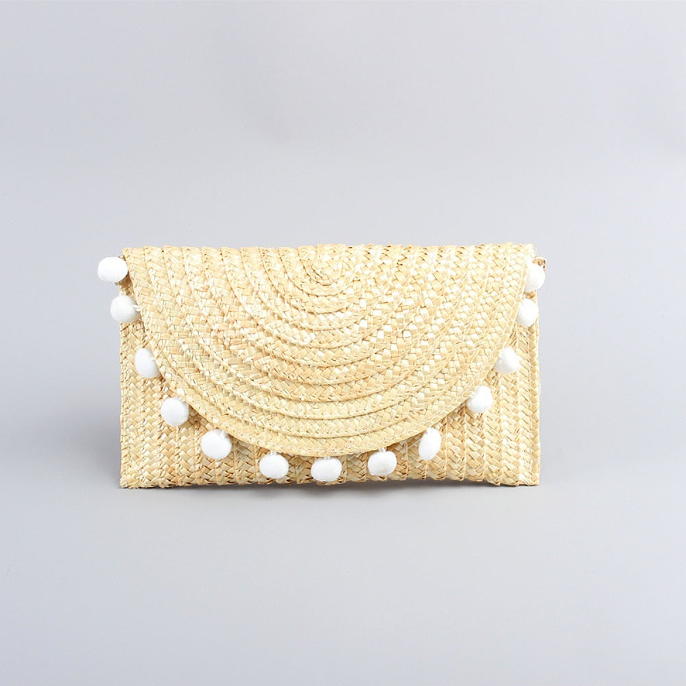 Pochette in paglia intrecciata