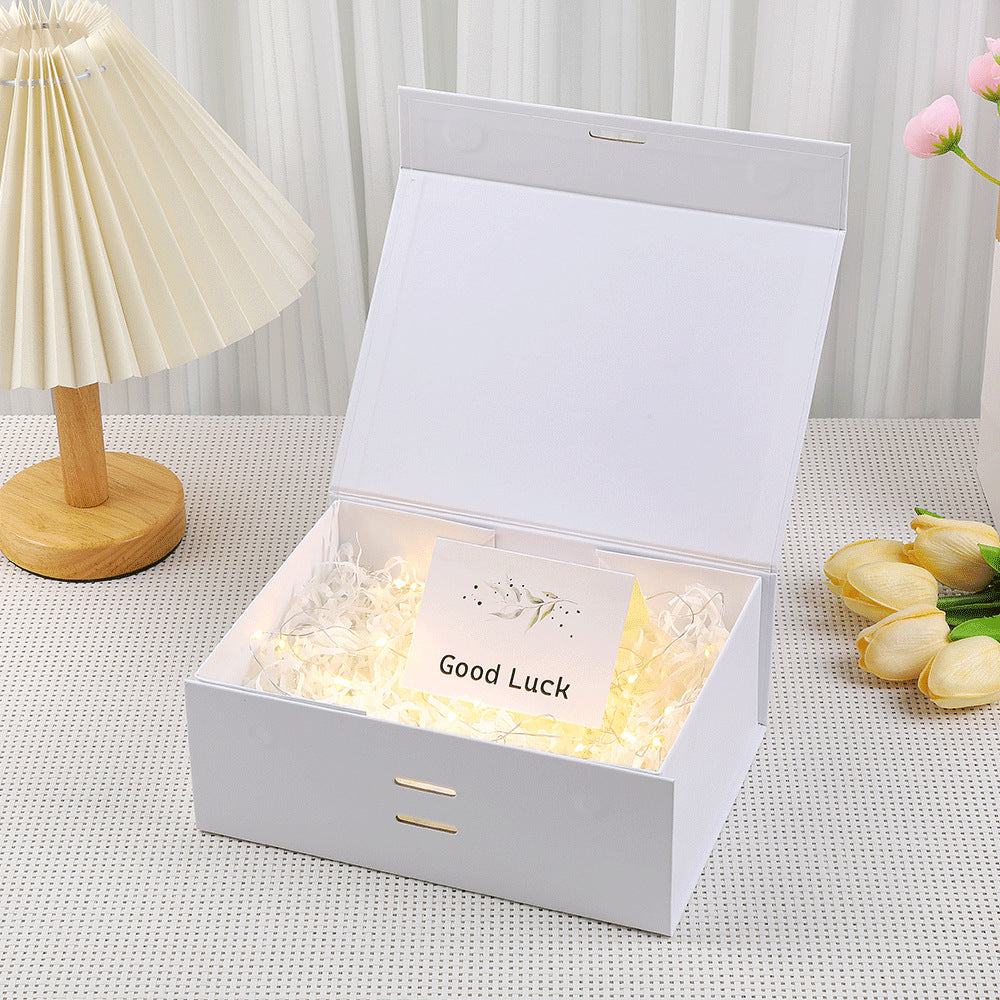 Scatola regalo magnetica premium con luci LED e biglietto d'auguri
