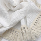 Sciarpa boho con frange e dettagli crochet