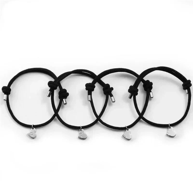 Set 4 bracelets magnetici con cuore in corda