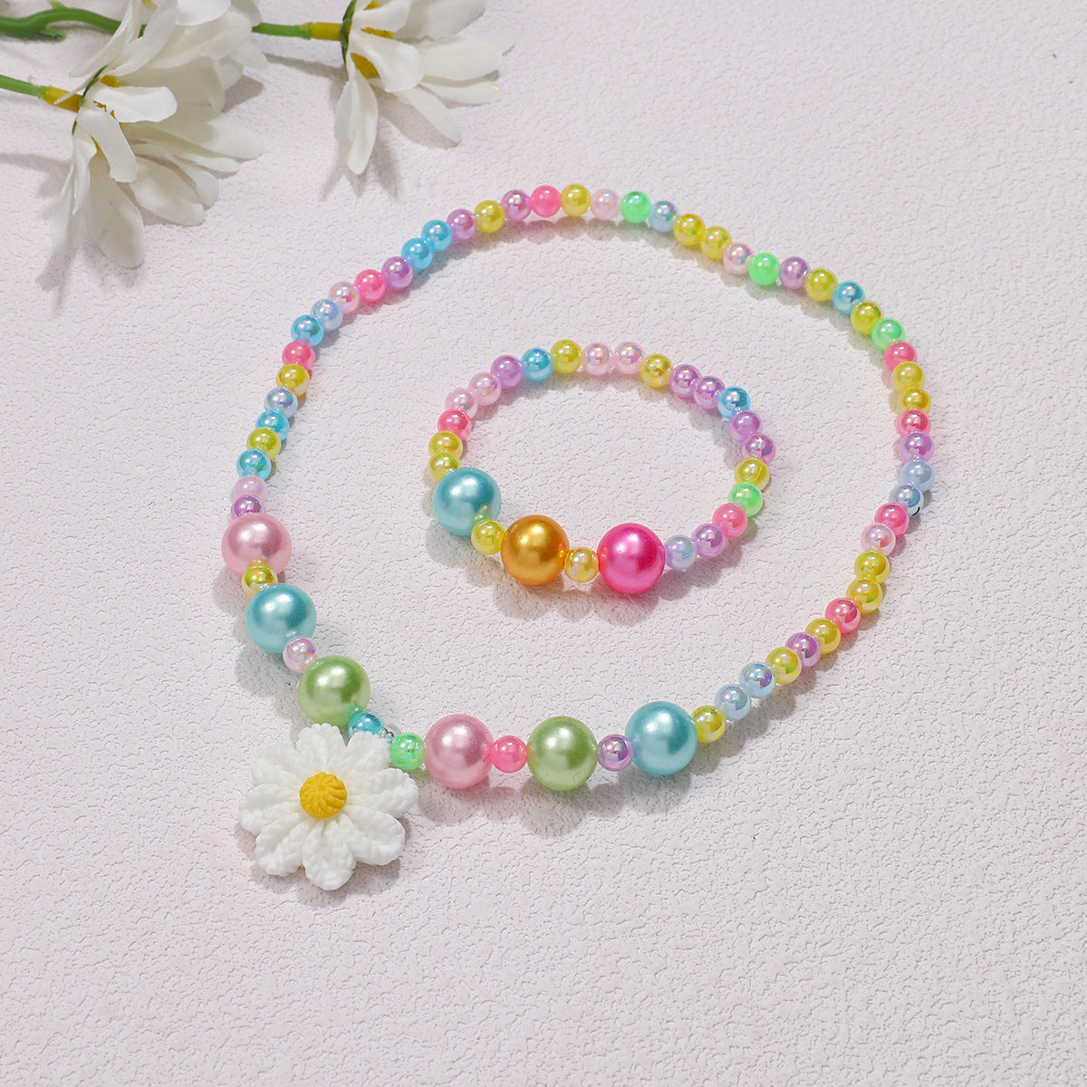 Set di gioielli giocosi con ciondolo a fiore