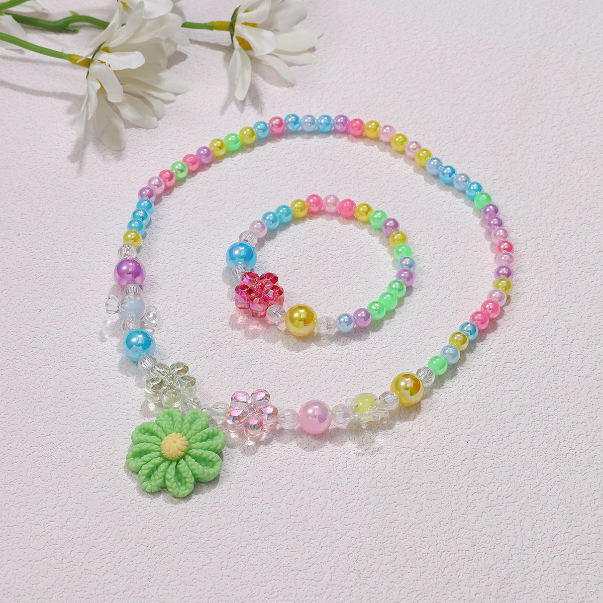 Set di gioielli giocosi con ciondolo a fiore
