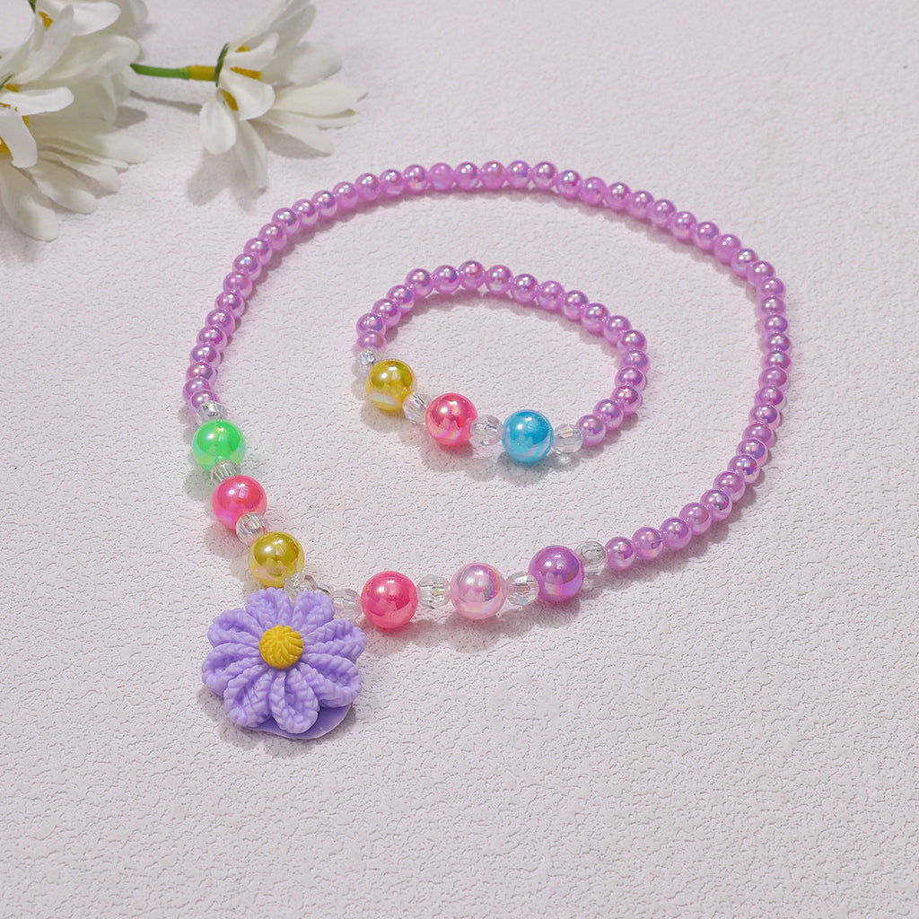 Set di gioielli giocosi con ciondolo a fiore