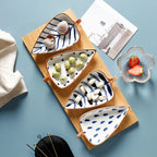 Set di piatti in ceramica dal design organico