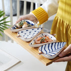 Set di piatti in ceramica dal design organico
