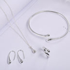 Set gioielli quattro pezzi con ciondolo anello