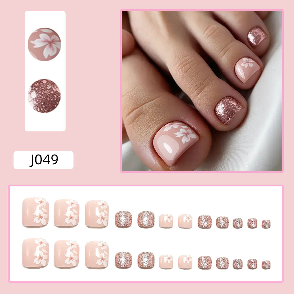Set unghie finte con design floreale elegante e glitter