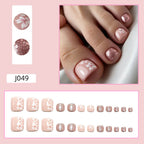 Set unghie finte con design floreale elegante e glitter