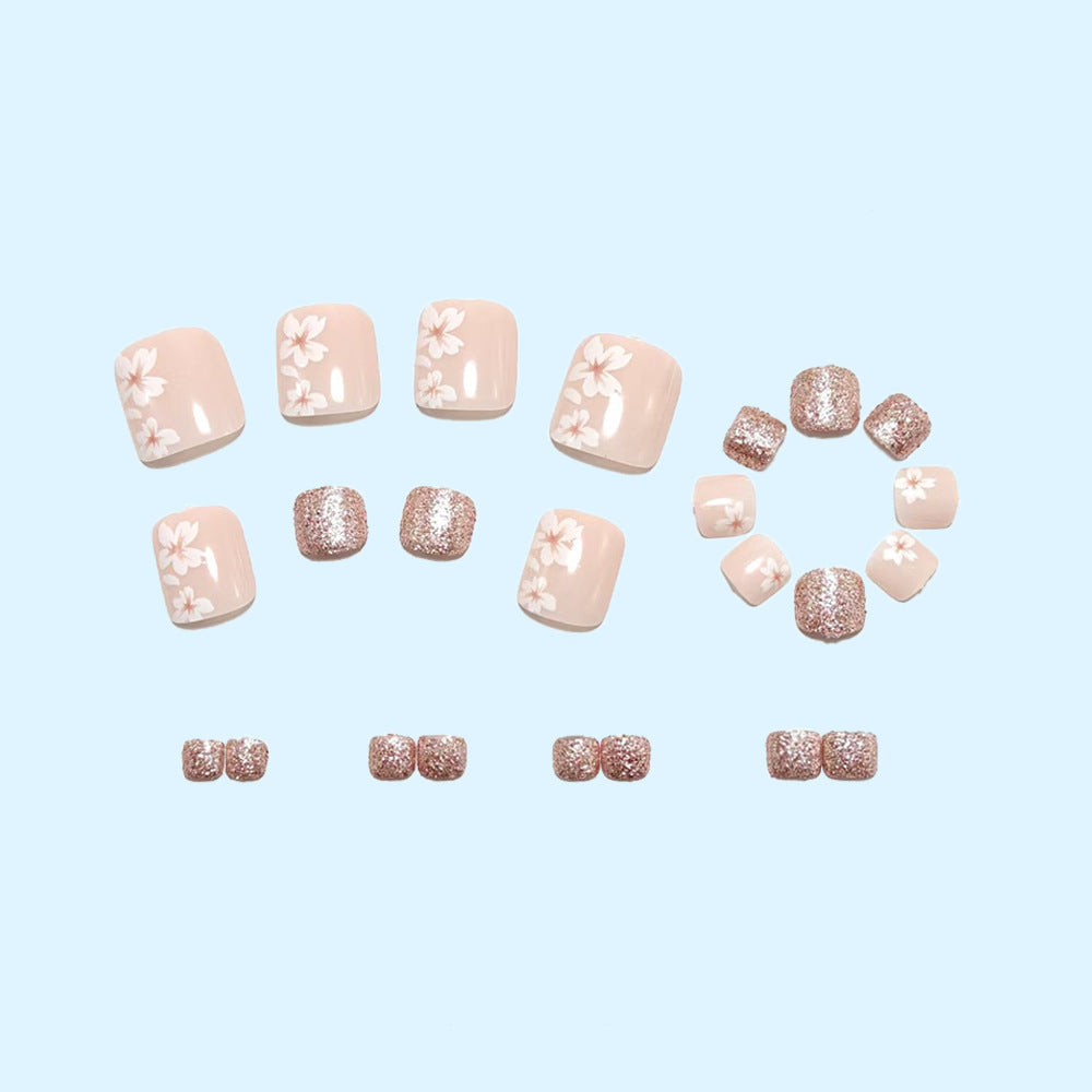 Set unghie finte con design floreale elegante e glitter
