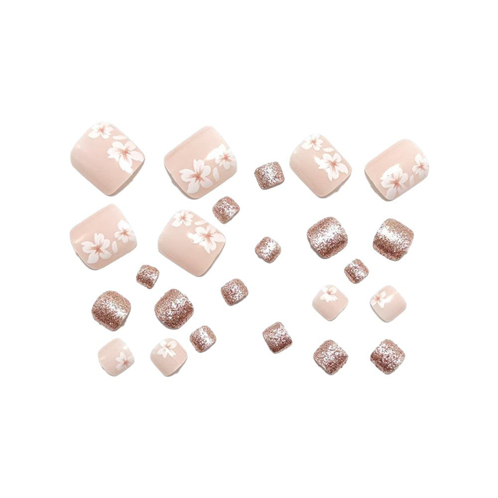 Set unghie finte con design floreale elegante e glitter