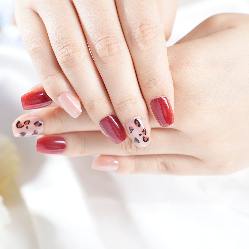 Set unghie finte leopardate con rosso