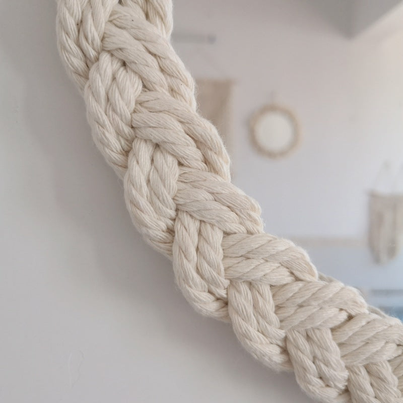 Specchio da parete decorativo con cornice intrecciata