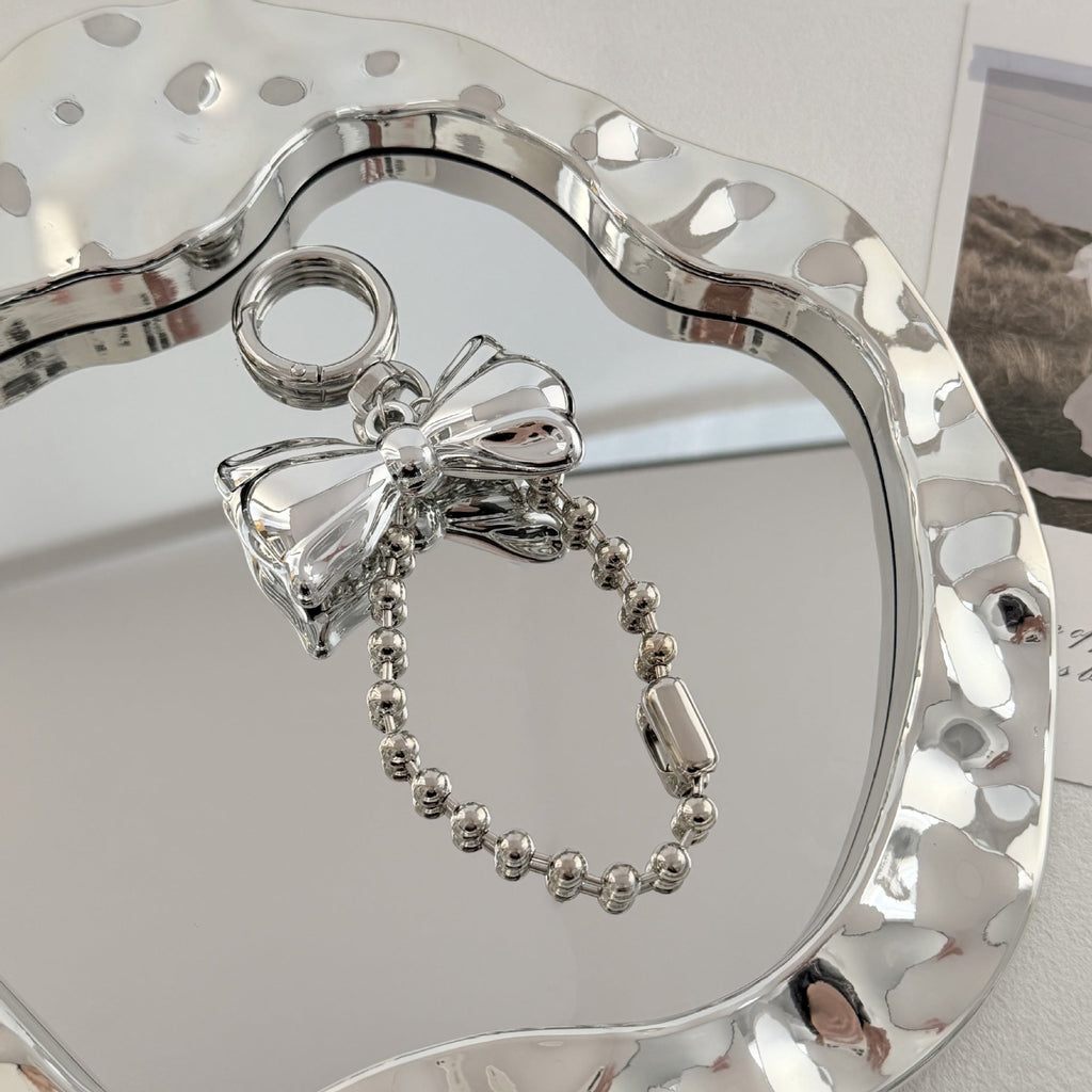 Specchio decorativo con fiocco