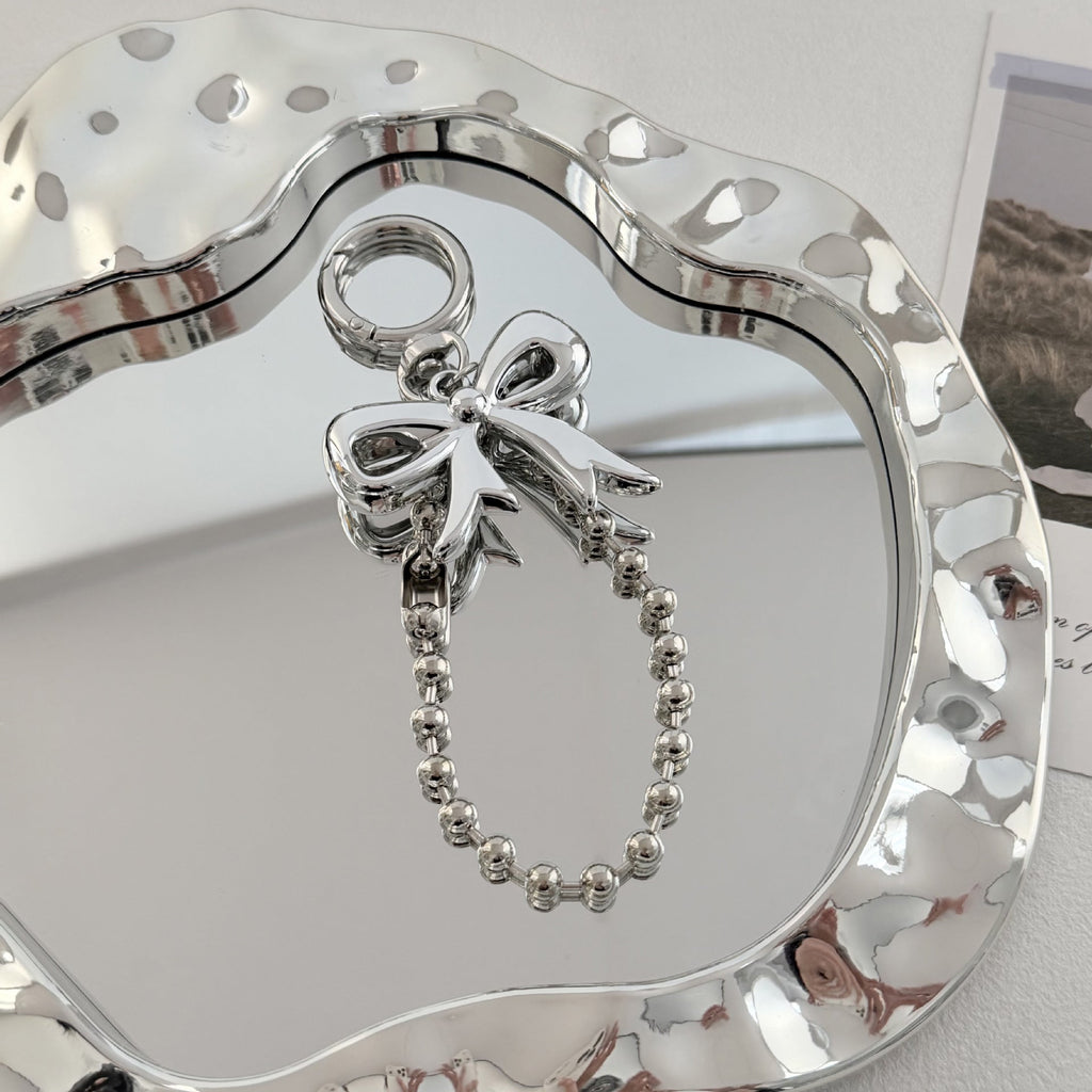 Specchio decorativo con fiocco