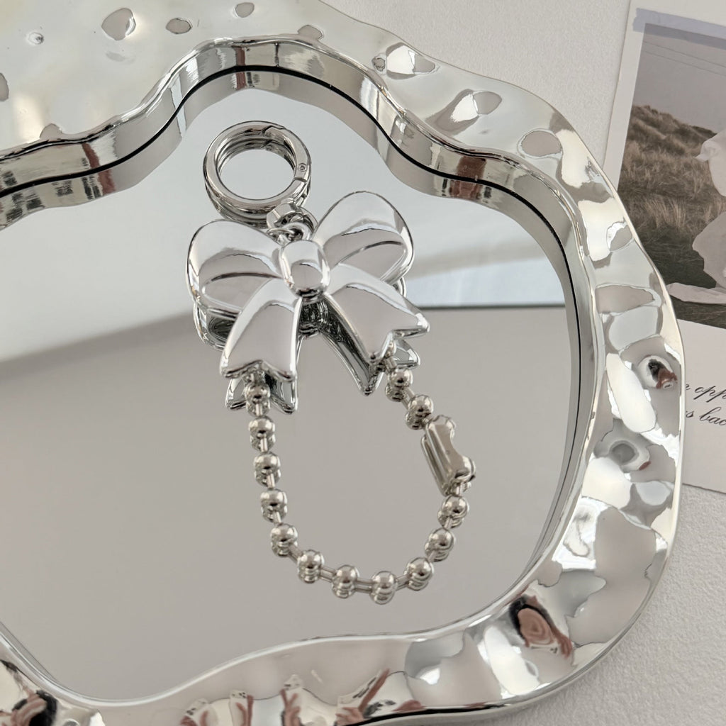 Specchio decorativo con fiocco