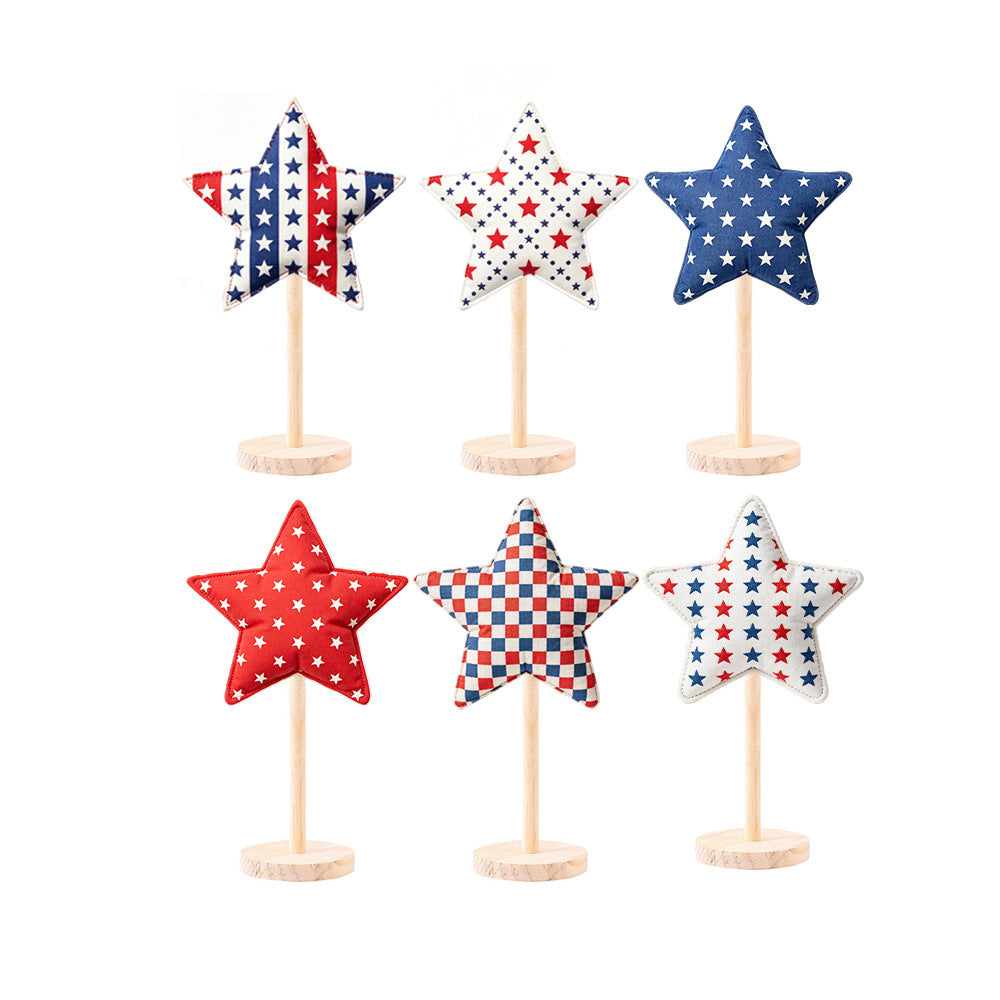 Stelle decorative in tessuto su base in legno