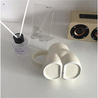 Tazza da caffè con curve femminili