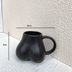 Tazza da caffè con curve femminili