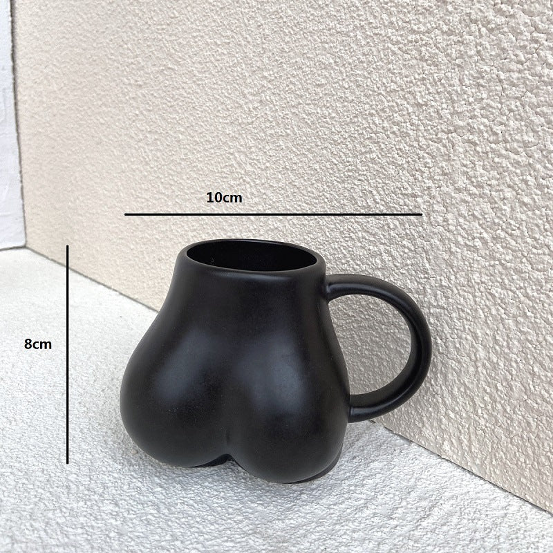 Tazza da caffè con curve femminili