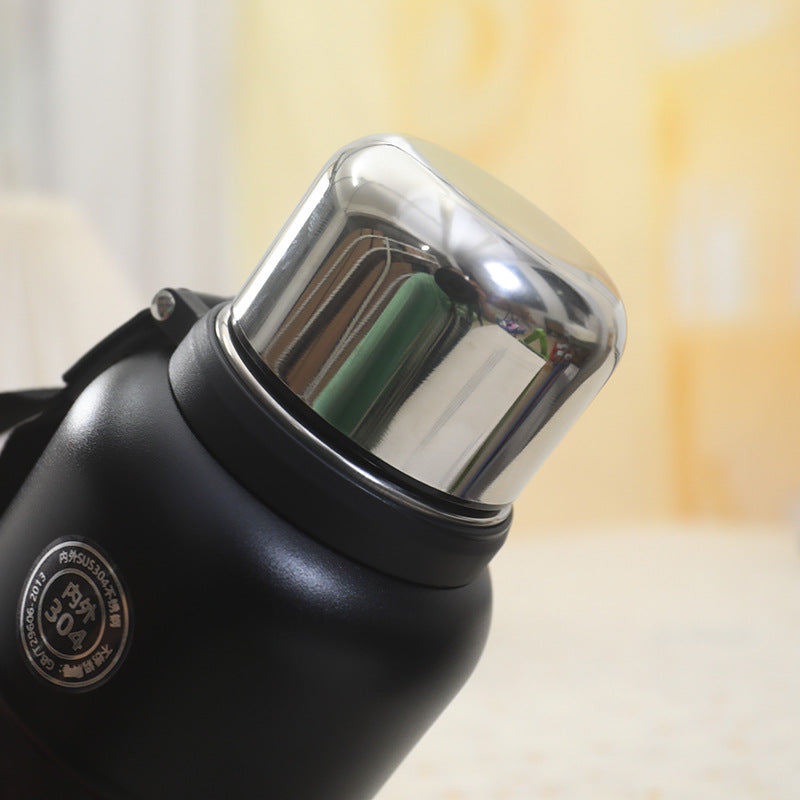 Thermos isotermico con tazza e tracolla regolabile